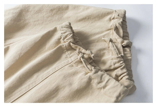Stylish men's drawstring baggy straight trousers in black and milky white colours
