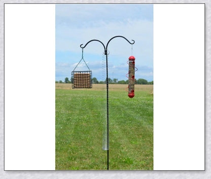 Squirrels Trouble - Squirrel-proof bird feeder accessory with spring-loaded mechanism to deter squirrels