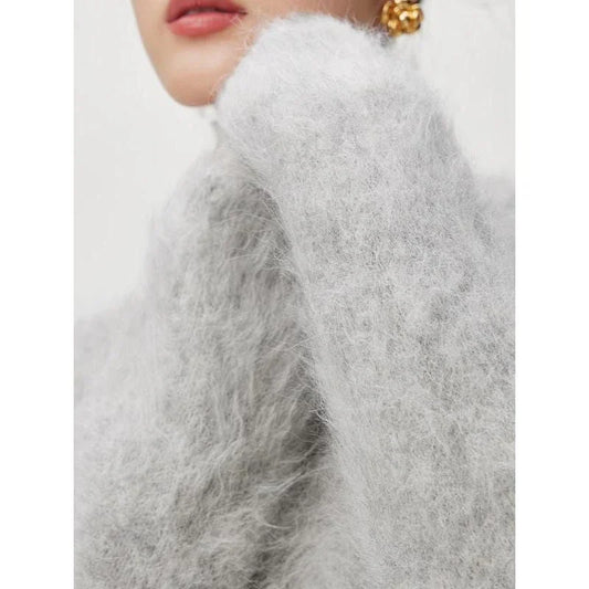 A stylish and cosy alpaca blend cardigan with a sophisticated design, perfect for transitioning between casual and office wear.