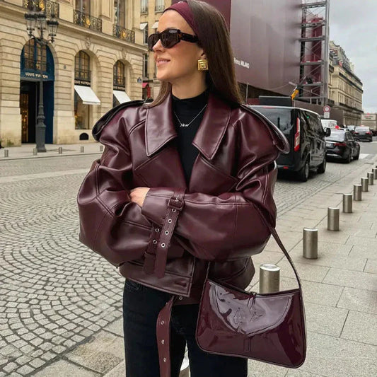 Stylish cropped leather jacket with loose lapel design, available in multiple trendy color options for fashionable streetwear