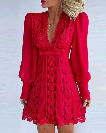 Elegant white lace dress with butterfly sleeves and a high-waist design, perfect for special occasions.