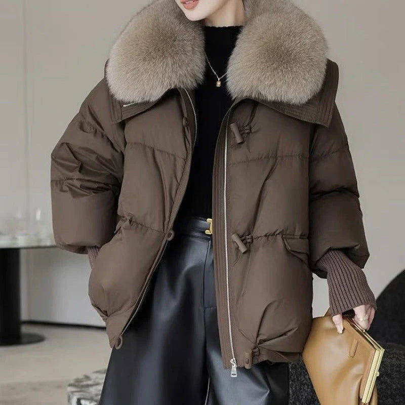 Premium down-filled puffer jacket with faux fur collar, available in brown, black, and white colours