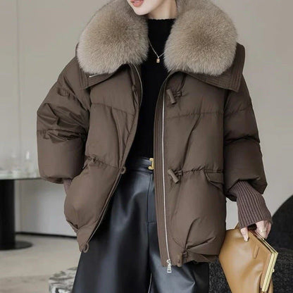 Premium down-filled puffer jacket with faux fur collar, available in brown, black, and white colours