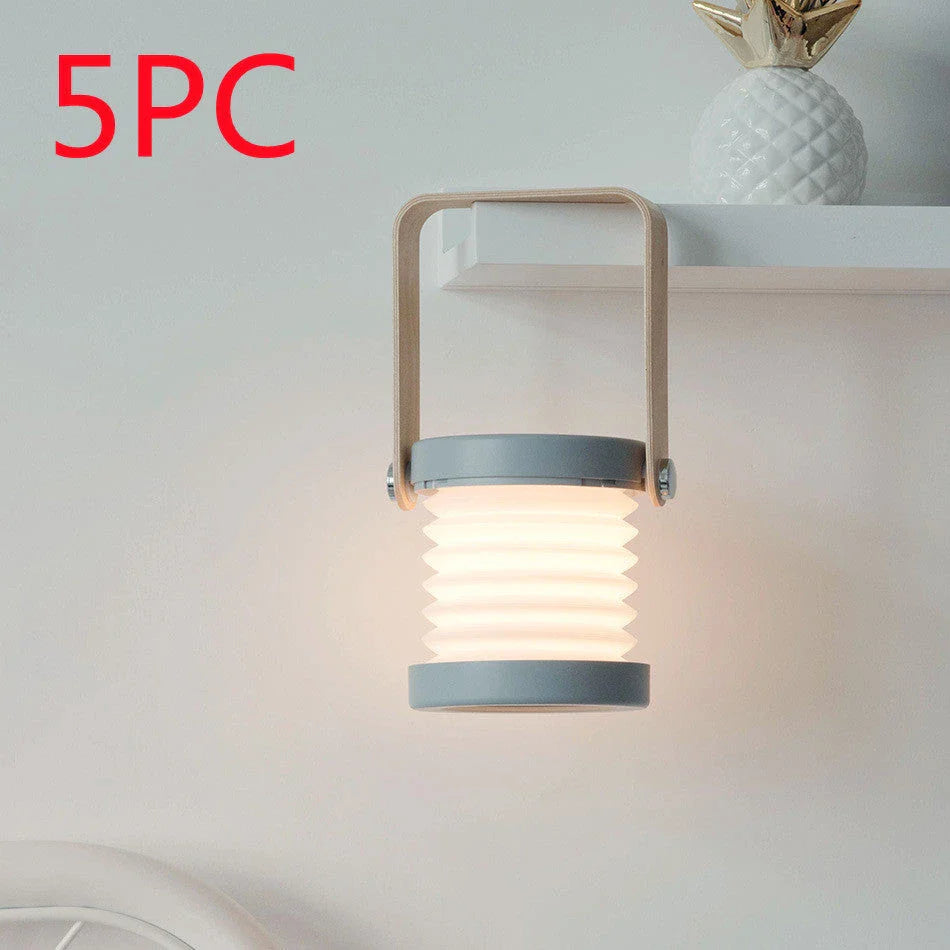 Elegant foldable LED lamp with touch-controlled dimming, rechargeable battery, and modern design for home decor