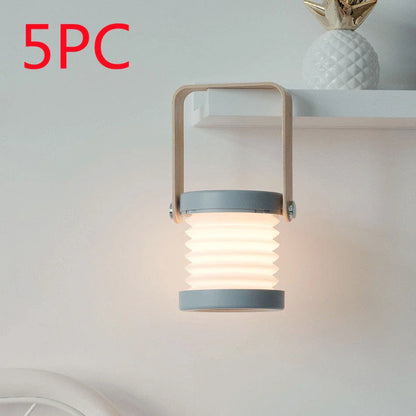 Elegant foldable LED lamp with touch-controlled dimming, rechargeable battery, and modern design for home decor
