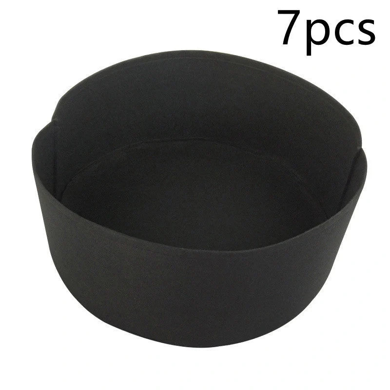 Round black and green fabric grow bags for garden plants with automatic drainage