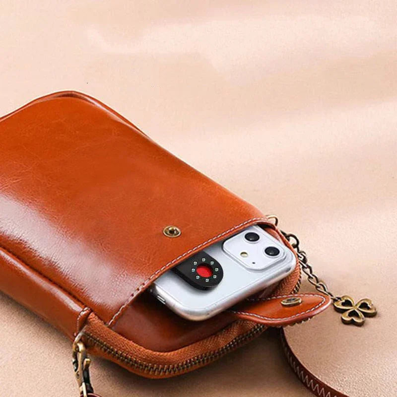 Compact, portable hidden camera detector device with infrared scanning technology to find hidden cameras in hotel rooms and other locations