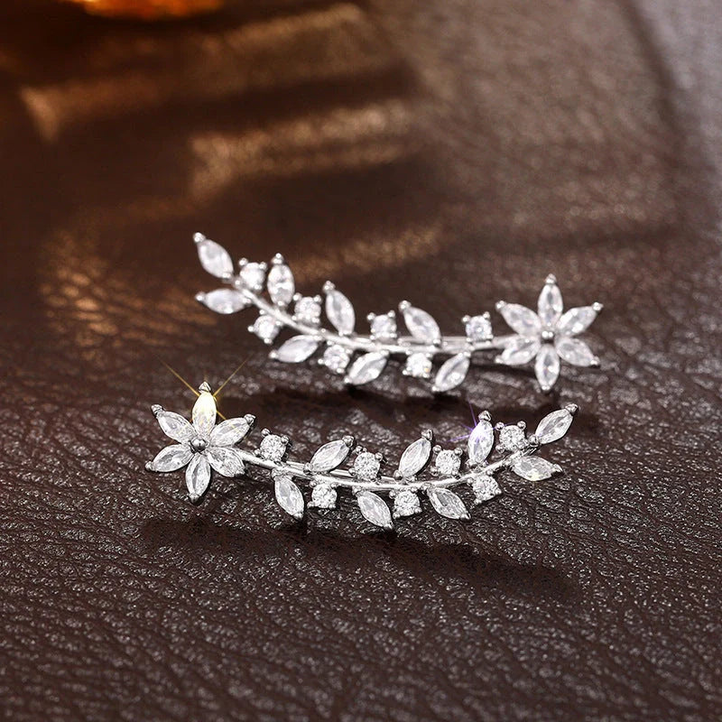 Stylish diamond flower earrings for women in white gold, gold, and rose gold