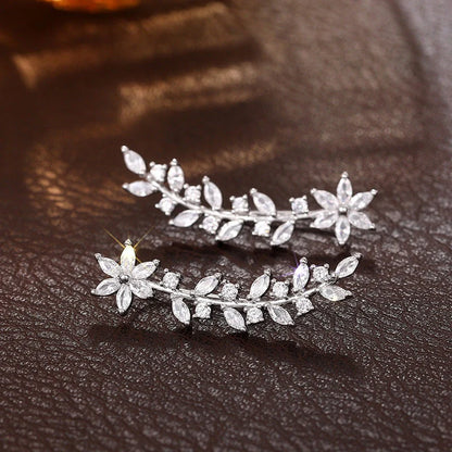 Stylish diamond flower earrings for women in white gold, gold, and rose gold