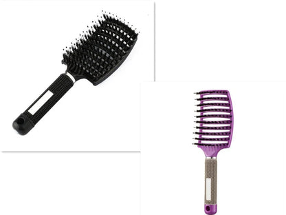 A premium hair brush with a sleek design, featuring soft bristles and a rounded massage function for healthy, detangled hair
