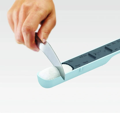 Adjustable 12-speed measuring spoon with gram scale for precise kitchen measurements
