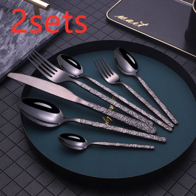 Premium steak cutlery set with embossed textured handles, made of durable stainless steel for a refined dining experience.