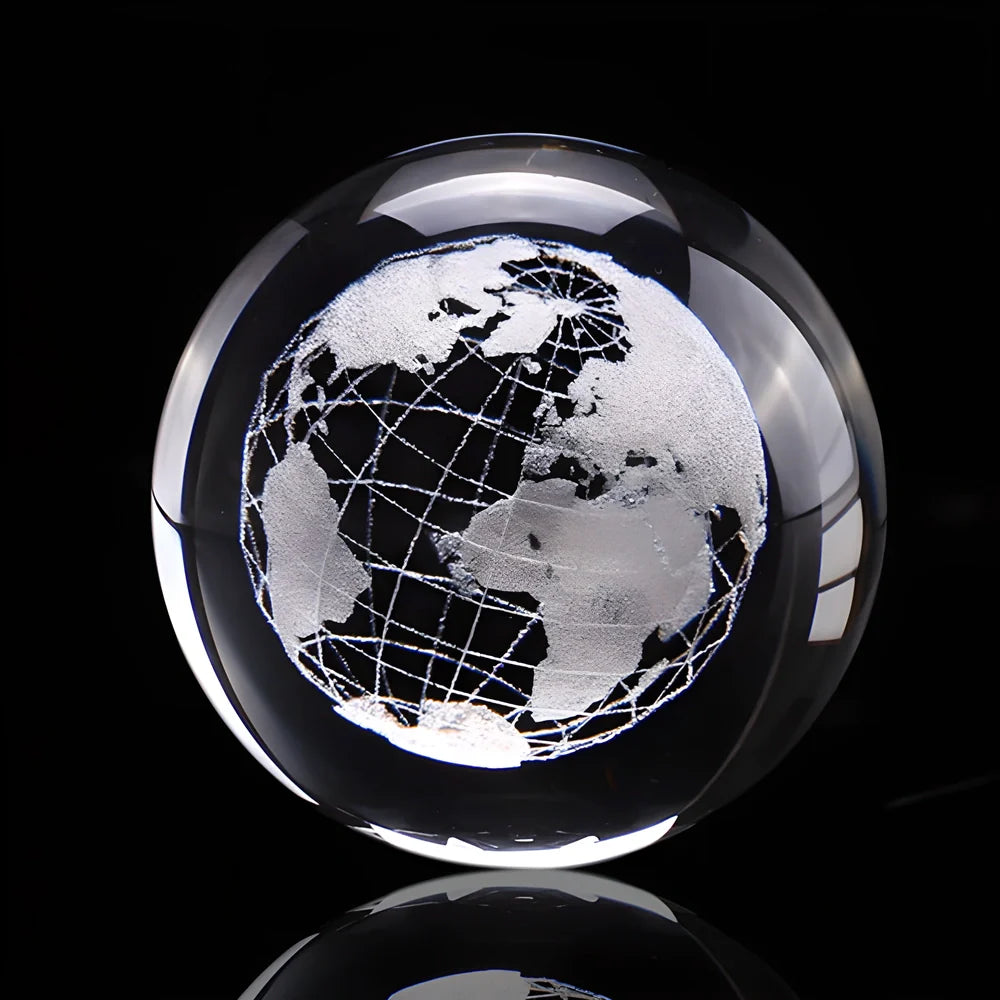 3D laser-engraved crystal globe with detailed representation of continents, countries, and latitude/longitude lines