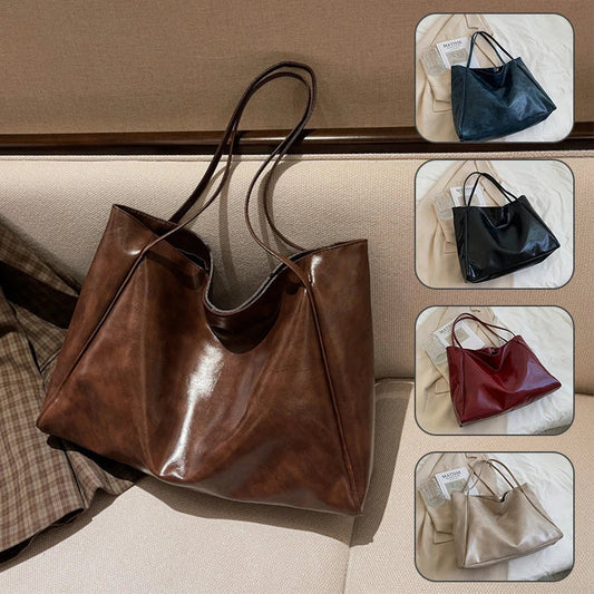 Premium faux leather shoulder bag in various colors, featuring a classic silhouette and roomy interior for everyday convenience.