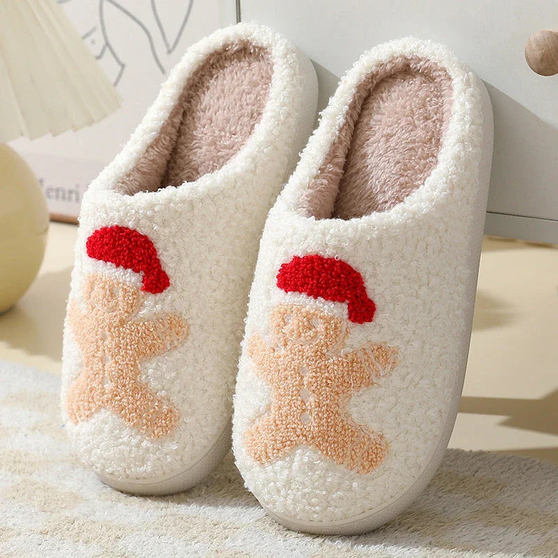 Cozy Christmas slippers in festive designs like Santa Claus, Moose, and Gingerbread Man, featuring plush lining and durable soles
