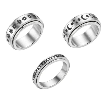 Titanium steel rings with captivating celestial designs including stars, moons, and floral motifs