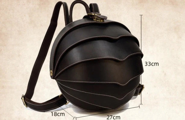 Vintage leather backpack in dark brown and black with multiple pockets
