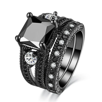 Dragon pattern stainless steel ring in black gold, showcasing intricate design and polished finish.