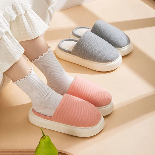 Cosy knitted fabric slippers in various colours and sizes, designed for couples to enjoy comfortable indoor relaxation.