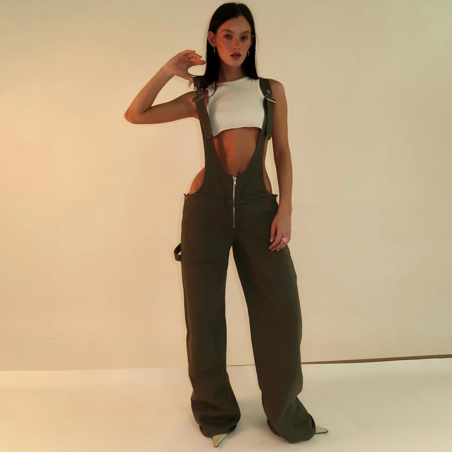 Stylish denim overalls with adjustable suspender straps, front and back pockets, and a comfortable micro-elastic fit, available in a variety of chic colors.