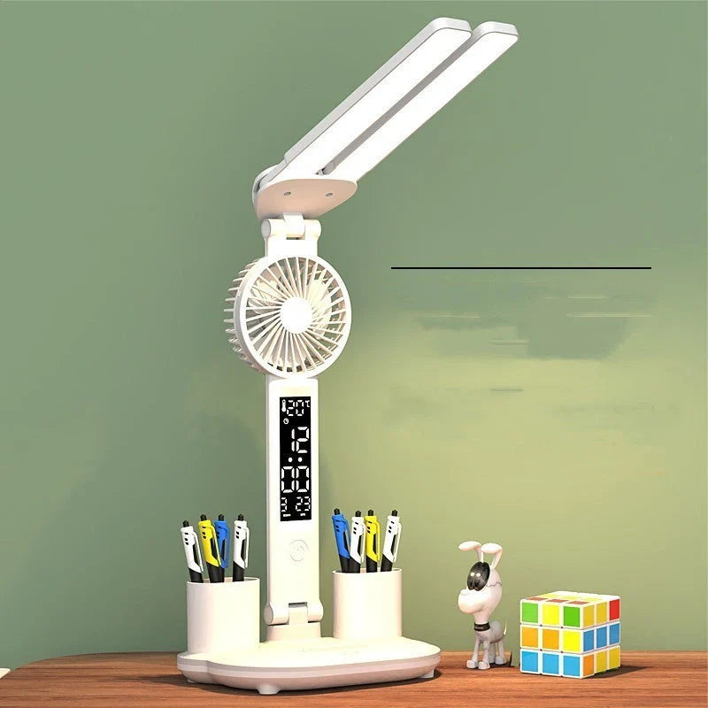 Foldable LED desk lamp with fan, thermometer, and pen holder on a tidy desk