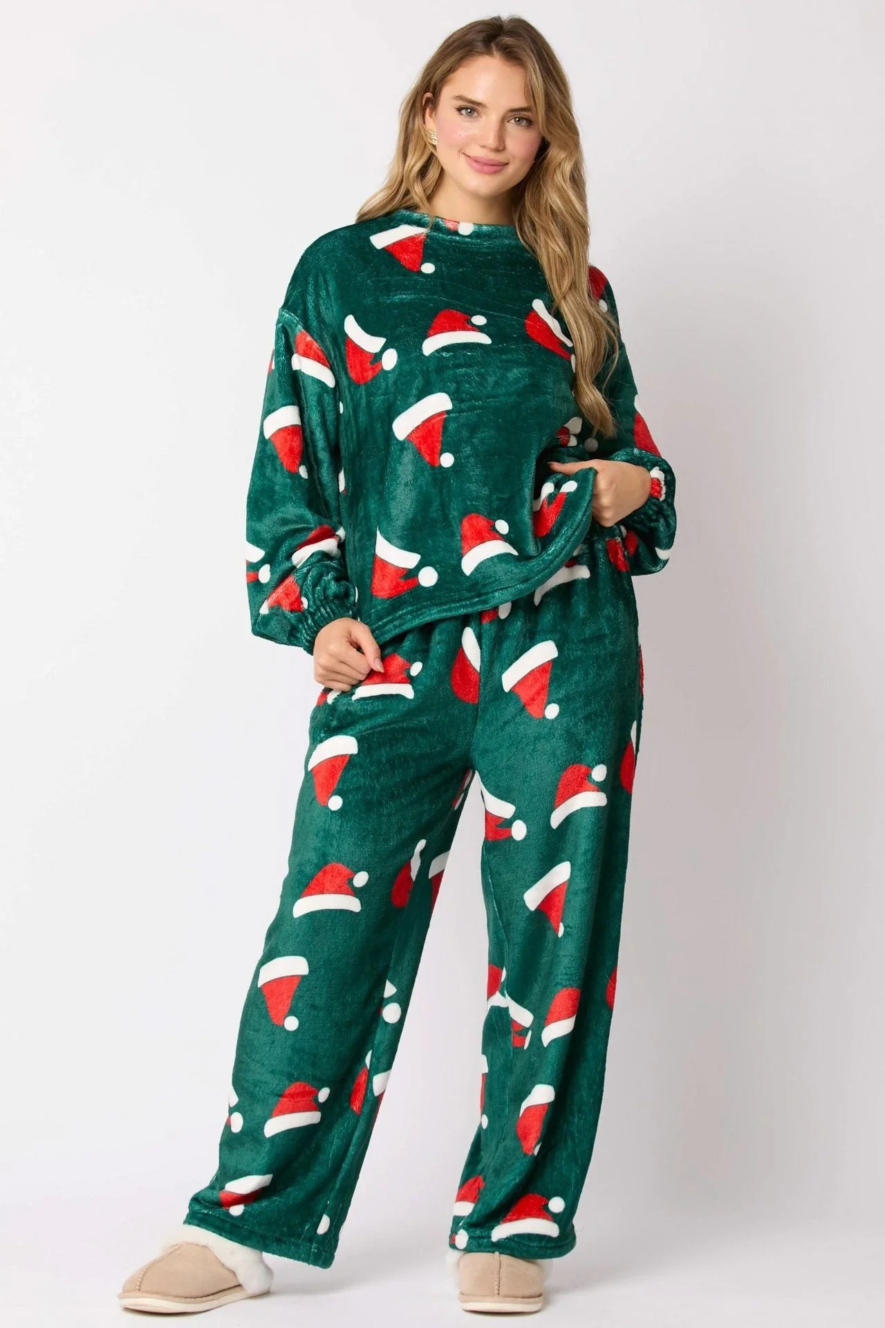 Women's festive flannel pajama set with Santa Claus design and long sleeves