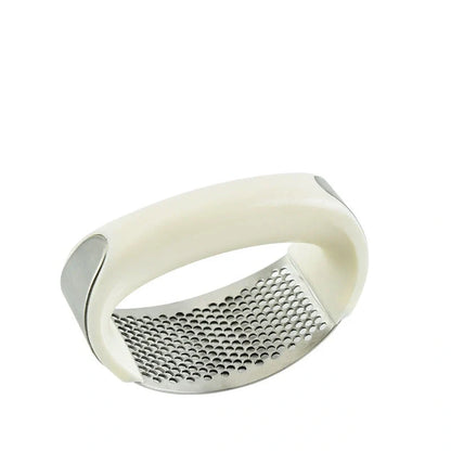 Stainless steel garlic press with ergonomic handle for easy mashing