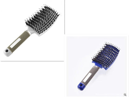 A premium hair brush with a sleek design, featuring soft bristles and a rounded massage function for healthy, detangled hair