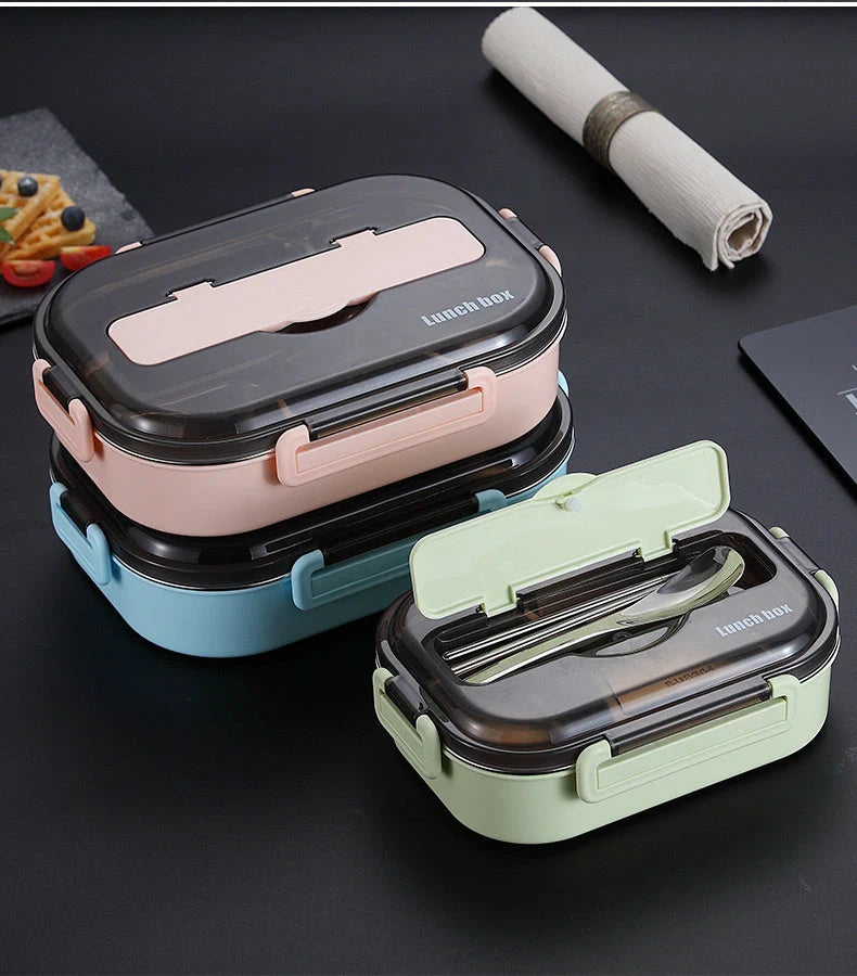 Dielectric insulated lunch box in green, blue, pink, and black with stainless steel interior