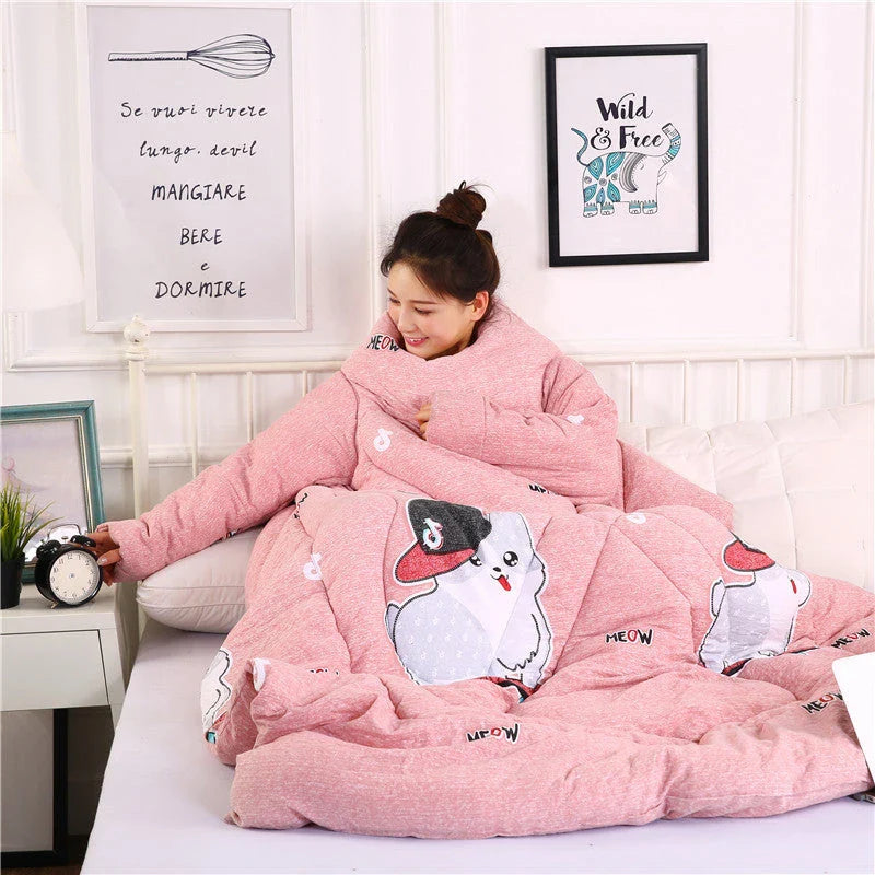 Cozy quilted lounger with sleeves in various colors and sizes, perfect for year-round indoor comfort and relaxation.