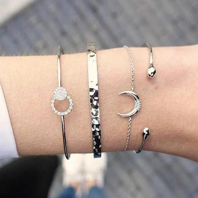 Adjustable geometric bracelet set with crystal and leaf motifs