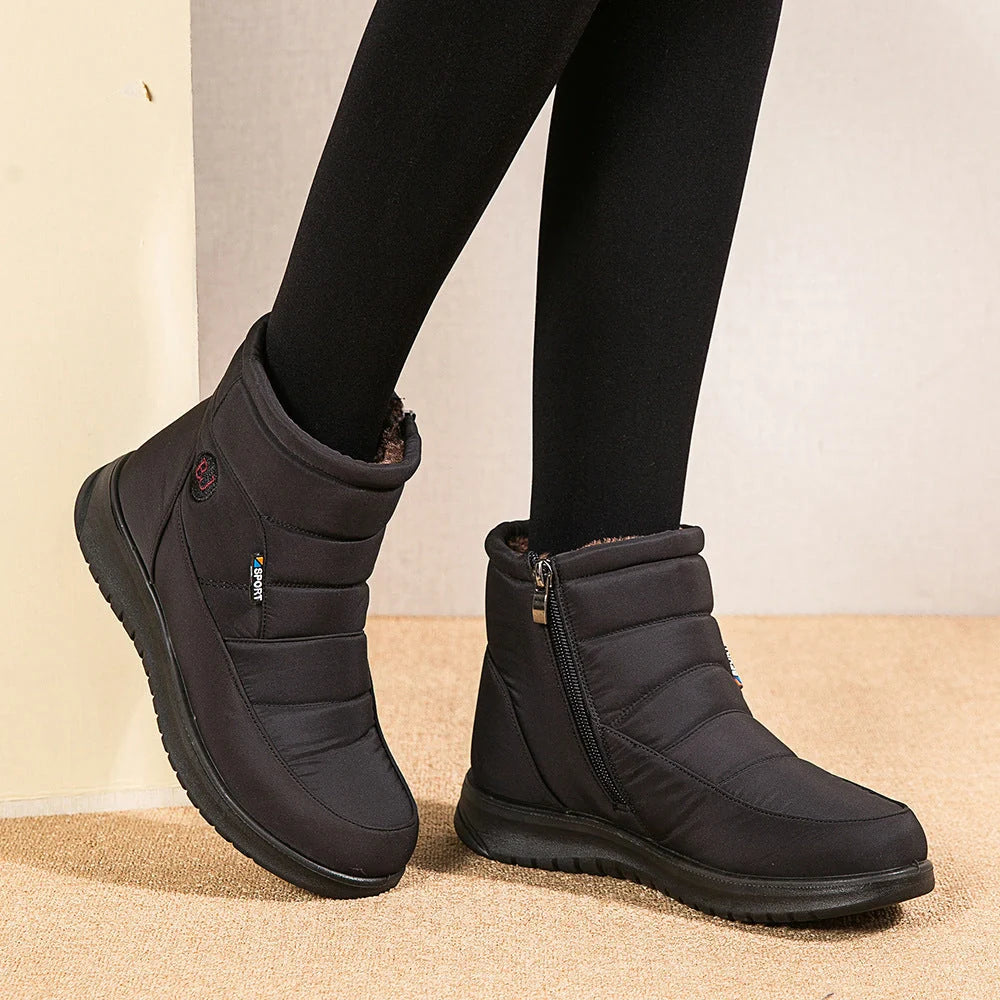 Women's waterproof snow boots in red, black, and brown with non-slip soles