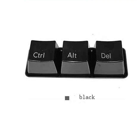 Three keyboard-inspired mugs in white and black colours, arranged on a wooden tray with a minimalist desk setting