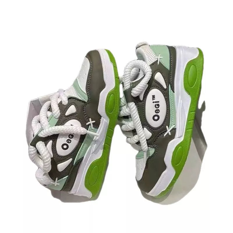 Women's round toe mid heel sneakers with muffin bottom design in black and fluorescent green