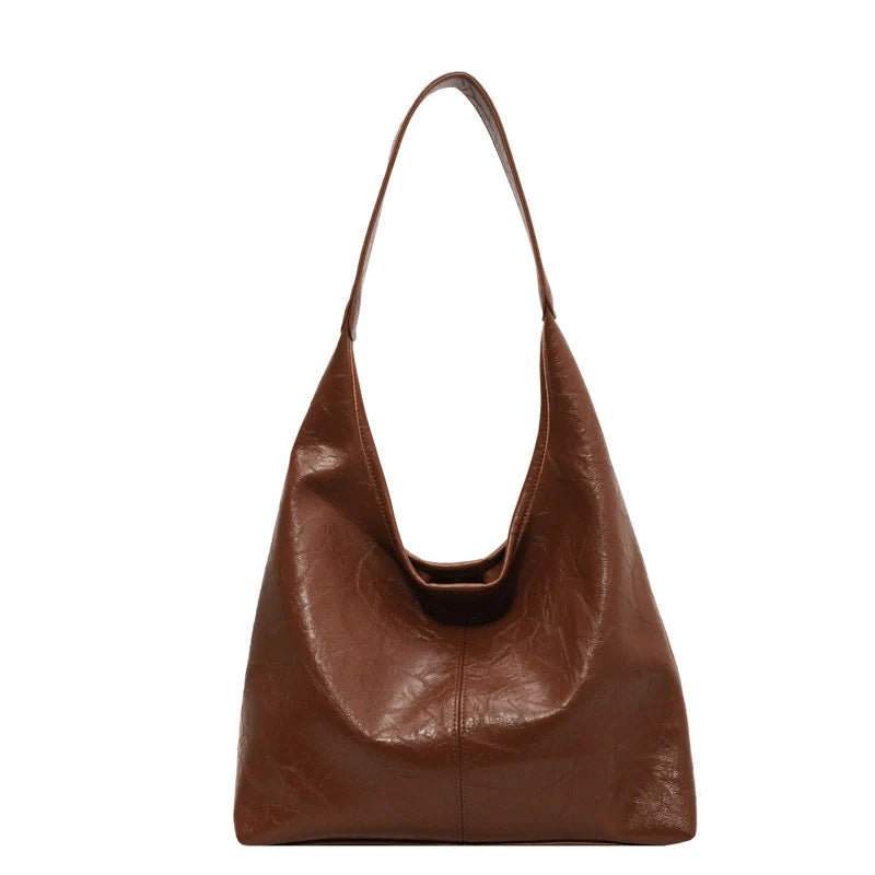 Elegant vintage designer women's shoulder bag in various colours