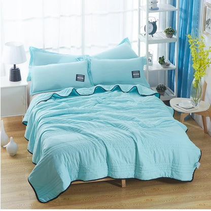 Premium cooling quilts in various colors and sizes for comfortable, temperature-regulating sleep