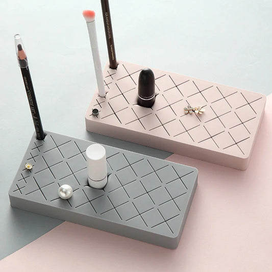 Silicone and ABS lipstick storage rack in red, pink, blue, and grey