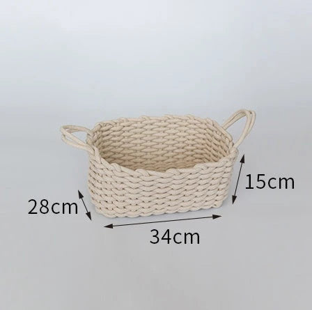 Hand-woven cotton rope storage basket in grey and white colours, featuring a minimalist nordic design for practical and stylish home organisation