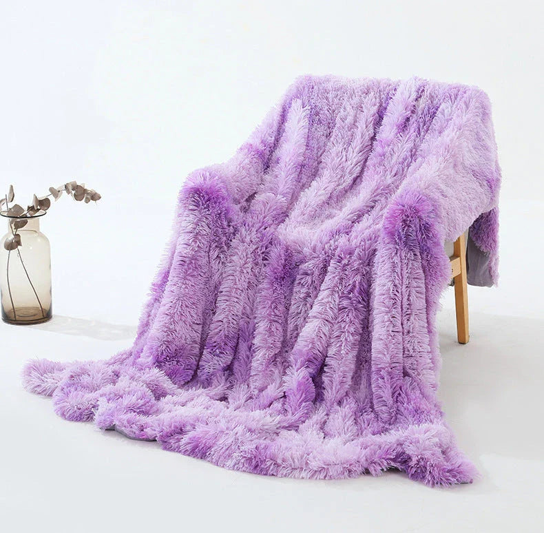 Cosy and luxurious faux fur throw blanket in a variety of colours and sizes, perfect for adding warmth and style to your living space