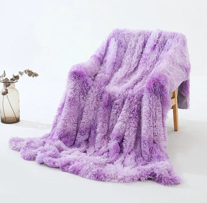 Cosy and luxurious faux fur throw blanket in a variety of colours and sizes, perfect for adding warmth and style to your living space