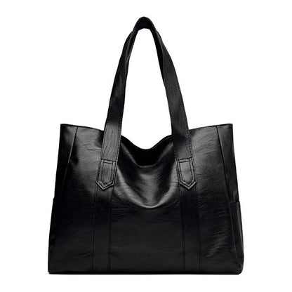 Stylish large capacity commuter shoulder bag in brown and black for autumn and winter
