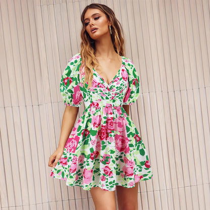 Stylish floral dress with V-neck and lantern sleeves, perfect for summer vacations and warm-weather occasions