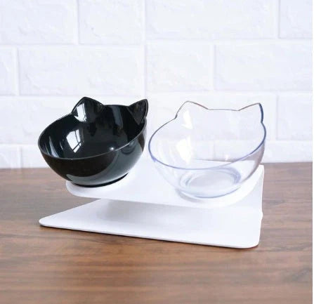 Inclined transparent cat food bowl with a gently sloped base and ergonomic design for whisker-friendly dining