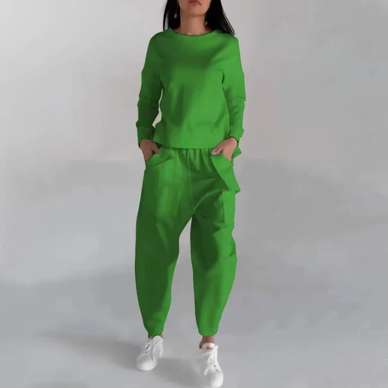 Stylish polyester sweatshirt with back slit, pockets, and available in various colors