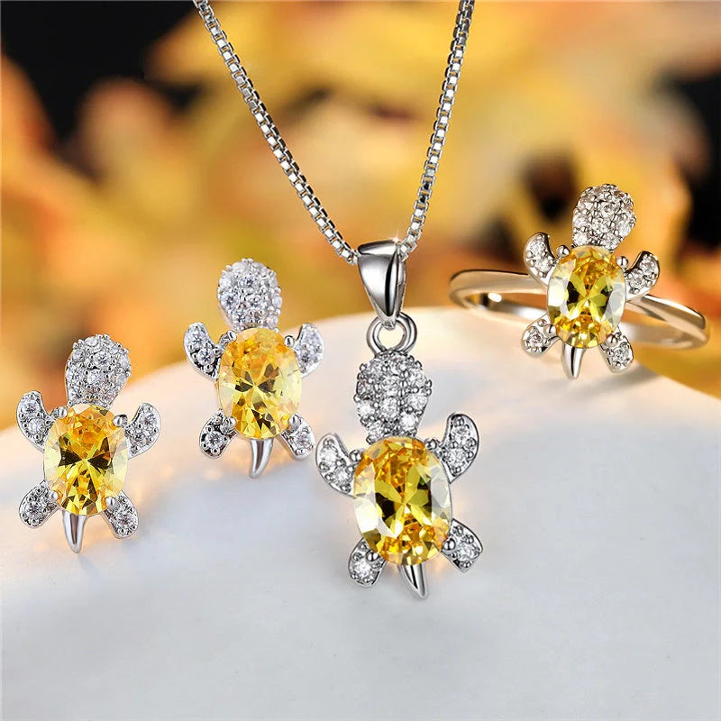 Stylish turtle pendant necklace with vibrant rainbow stones, perfect for women and children.