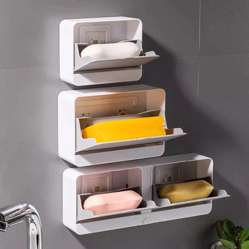 Stylish bathroom soap dispenser with wall-mounted storage box and drainage design