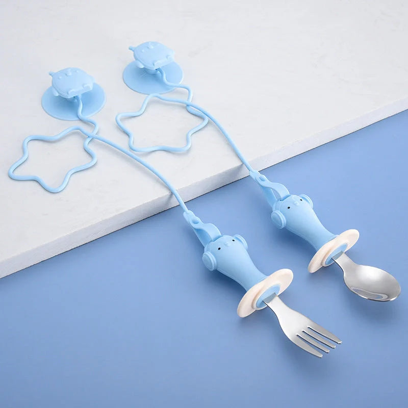 Stainless steel infant training spoon and fork set with silicone anti-drop chain and suction cup