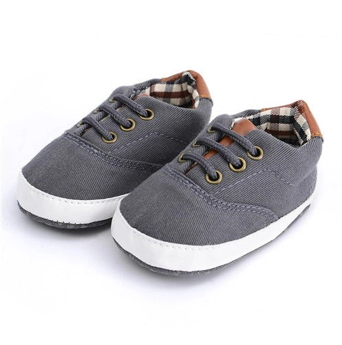 Solid colour baby canvas shoes with soft bottom and front strap in sizes 11cm to 13cm