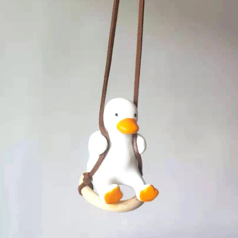 Car Swing Duck Ornament hanging from rearview mirror