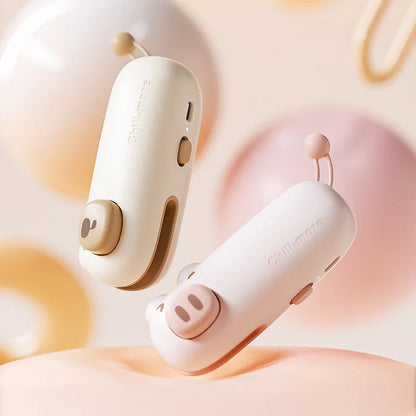 A compact, rechargeable bag sealer with a unique cartoon design, perfect for preserving food freshness at home or on the go.